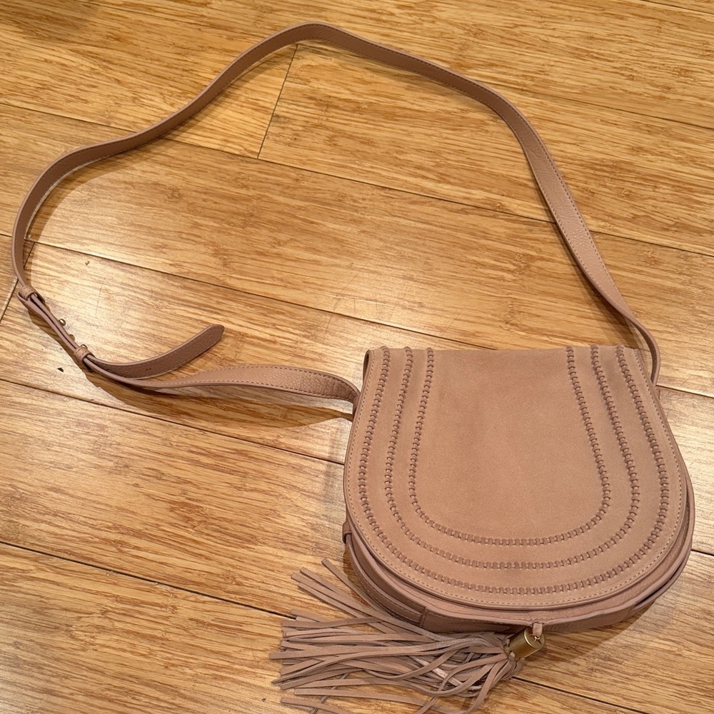 Vince Camuto light muted pink western bag with tassel and braided detail